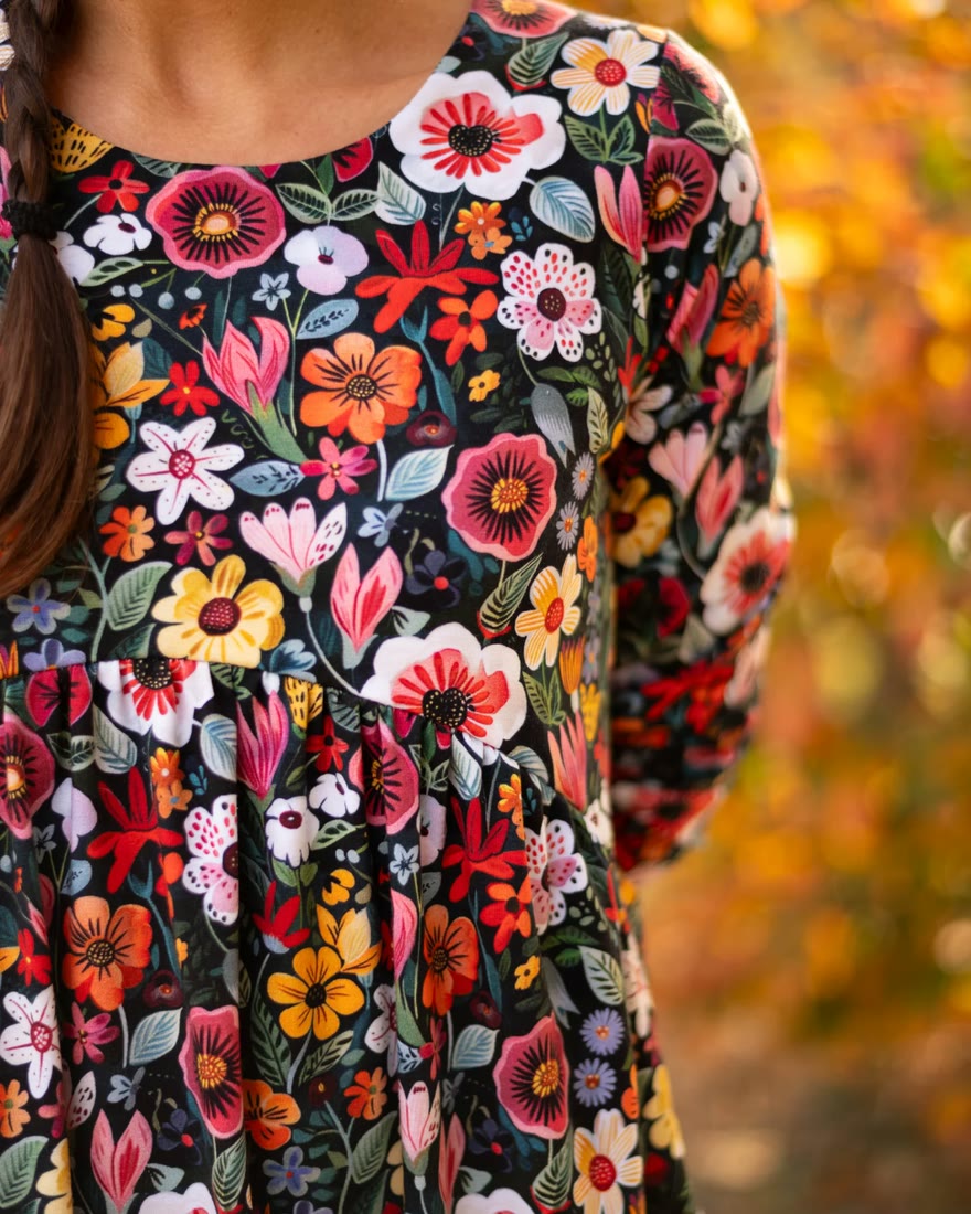A long-sleeved printed jersey dress, sewn from a customer’s own design