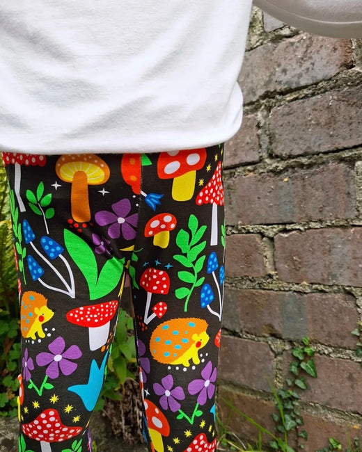 Leggings in a custom print, worn