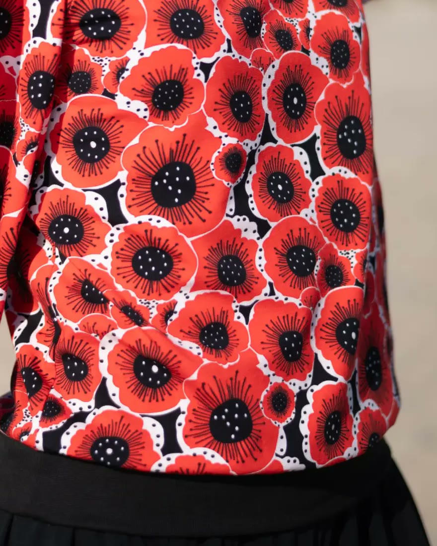 A poppy-print jersey blouse with gathered sleeves